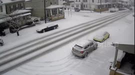 Lightly snowing in a small town