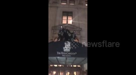 Celebrating Philadelphia fans jump off Ritz-Carlton Hotel canopy