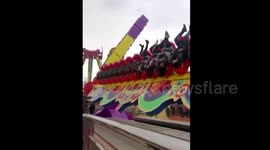 Passengers dangle upside down when China theme park ride gets stuck
