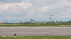 multiple helicopters passing by Helicopter show Hradec Kralove