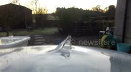 Squirting water out of a hollow ice formation