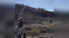 Newsflare Edit - Young Girl Shooting a Shotgun Shell *Slow-Mo*