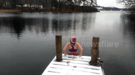 Swimmer braves icy-cold waters of Lake Windermere