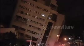 Taiwan quake destroys three floors of building