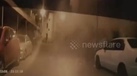 Dramatic dash-cam footage shows building collapse in front of cars