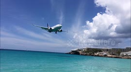 Planes landing at Maho Beach in St Maarten.