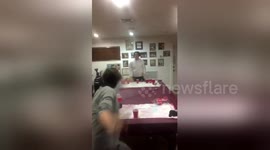 Man nails 360-degree slam dunk at beer pong