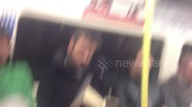 RACIST WOMAN ON LONDON TUBE GETS PUNCHED PART 1 -- ORIGINAL UNCUT