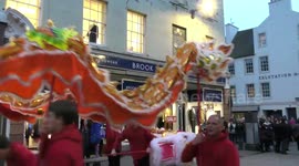 Chinese New Year Parade through Perth City centre and over river Tay, Scotland