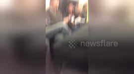 Newsflare Edit - RACIST WOMAN ON LONDON TUBE GETS PUNCHED PART 2 -- ORIGINAL UNCUT