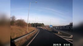 Dramatic dash cam captures car cutting up lorry with inches to spare