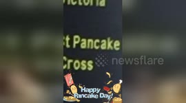 Commuters head into London 'St Pancake' on Shrove Tuesday