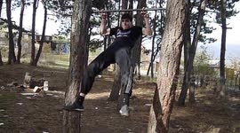 Lifting and rolling on the horizontal bar with only middle fingers.