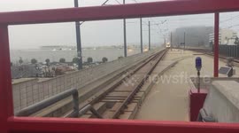 Train Comes Into Foggy Station