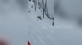 Snowmobile rider gets taken out by own sled