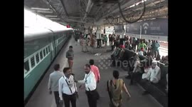 Alert railway official saves passenger from slipping under train