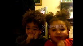 Two-year-old laughs adorably after getting cousin told off