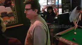 Girls playing Jenga in a bar