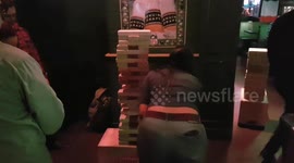 playing Jenga in a bar