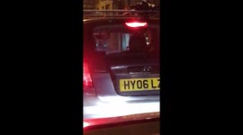 Driver watches tv on his phone whilst driving