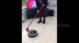 UK mum tries her hand at curling with a Roomba and the broom