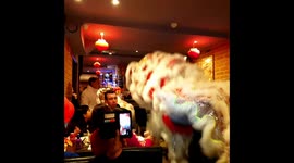 Two dragons fighting in a Chinese restaurant in celebration of Chinese Lunar New Year. Chinatown, London