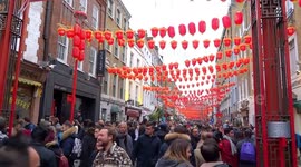 Chinese red lanterns fly above Wardour Street as London celebrates Chinese New Year 2018
