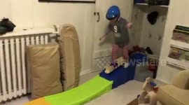 Boy, 4, falls over 'snowboarding' in playroom