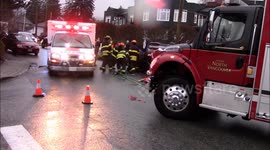 North Vancouver Firefighters extract a person from a Rolled Over Vehicle