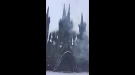 Gothic Castle in fire. Art object made of branches. This is not a church. The author of this building is an architect so he build a gothic construction. Old Russian tradition on Maslenitsa is to burn away constructions made of seasoned branches