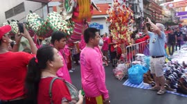 Three dragon dances and a human pyramid