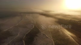 Beautiful ocean fog sunrise at Castlerock beach, Northern Ireland