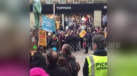UCU members walk along in Glasgow after pension scheme