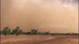 Huge wall of dust towers above Queensland