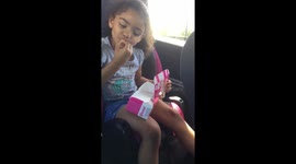 Little 4 year old girl loves eating Dunkin‘ Donuts