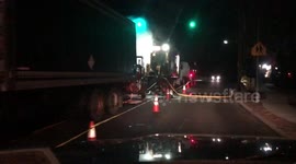 Night road crew working drive by lots of steam