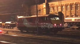 Electric locomotive drops pantograph