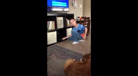 Boy tries inserting cash in PlayStation for purchase