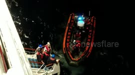 Handing Cubans rescued at sea over to coastguard.