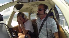 Watch a woman’s reaction after seeing proposal spelled out from plane