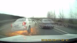 Dramatic video shows overtaking car sent flying across road