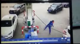 Gas attendant gets flipped when car leaves with pump still attached