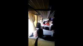 Bus driver and conductor fighting in front of passengers