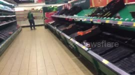 Shoppers empty supermarket shelves ahead of Storm Emma