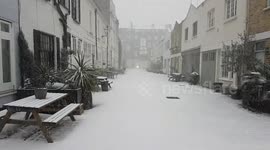 Snowy day in London mews
