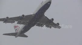 British Airways 747 takeoffs in snow from London Heathrow