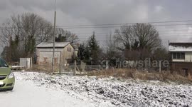 High speed train blowing snow from the tracks