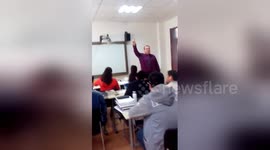 Teacher pranks class by smashing a phone to bits