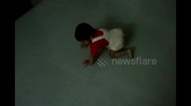 Baby spinning on the floor. He knows how to spin the right way