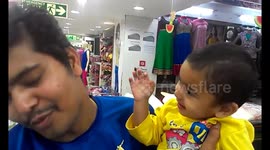 Kid slapping, kissing and biting nose.